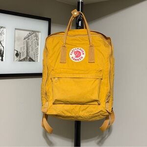 Yellow Fjällräven Kanken backpack yellow